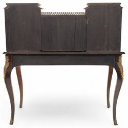 Late 19th-century Louis XV revival gilt bronze mounted and walnut Bonheur-de-Jour, rectangular-shaped serpentine form, with gilt bronze beading, frieze with two blind drawers and gilt bronze handles, centre drawer with large central serves style porcelain plaque, the elevated section with brass gallery above panelled cupboard doors also with serves style porcelain plaques and gilt bronze mounts, interior with single shelf, central section with four drawers each with gilt bronze handles, raised on slender cabriole legs fitted with gilt bronze rococo style masks and sabots