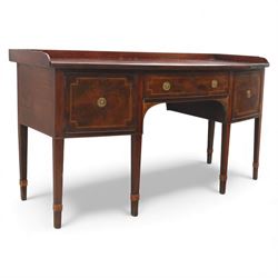  George III mahogany bow-front sideboard, the top with shaped gallery back above one frieze drawers, each outlined with strung inlay, flanked by deep cupboard doors, raised on square tapering legs with spade feet