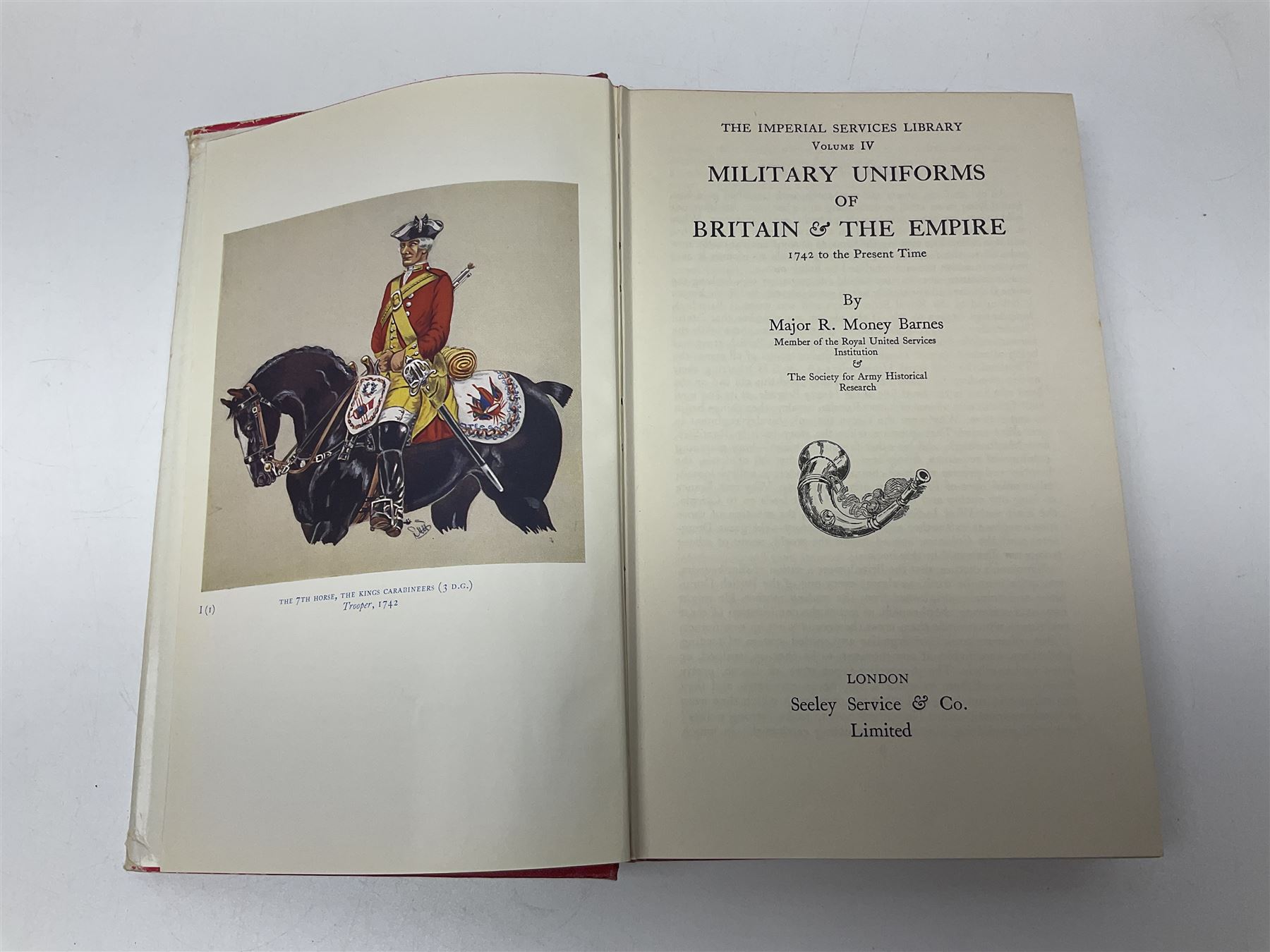 Seven military reference books - Histoire Mondiale Des Parachutistes; Yves Debay: French Foreign Legion  Paratroopers; Bragg & Turner: Parachute Wings; Barney White-Turner: Horse Guards; and three works on uniforms/standards (7)