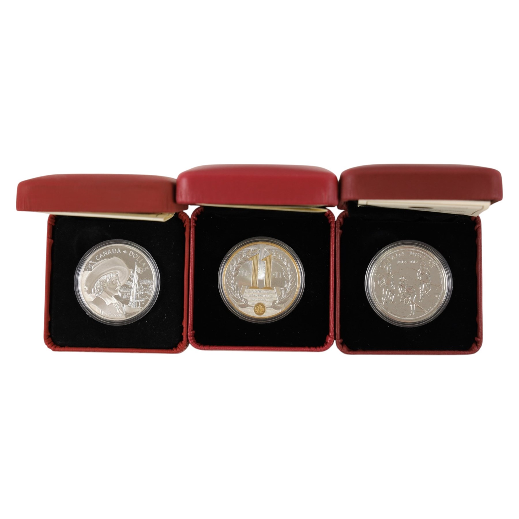 Nine world silver coins or sets, including The Royal Mint United Kingdom 1977 silver proof fifty pence two coin set, 1977 'Silver Jubilee' silver proof crown, USA 2014 'National Baseball Hall of Fame' silver dollar, Australia 2007 '75th Anniversary of the Sydney Harbour Bridge' one dollar fine silver coin, etc, together with a Canada 1975 one dollar, mostly cased with certificates