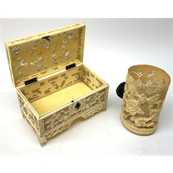 19th century Cantonese carved and pierced ivory small trinket box, L13.5cm and a similar cylindrical vase on hardwood stand H11cm (2)