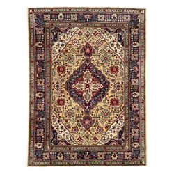 Persian Heriz pale wheat ground rug, indigo pole medallion surrounded by neatly arranged H...