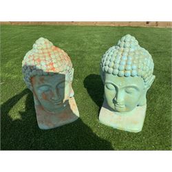 Pair of composite painted Buddha heads