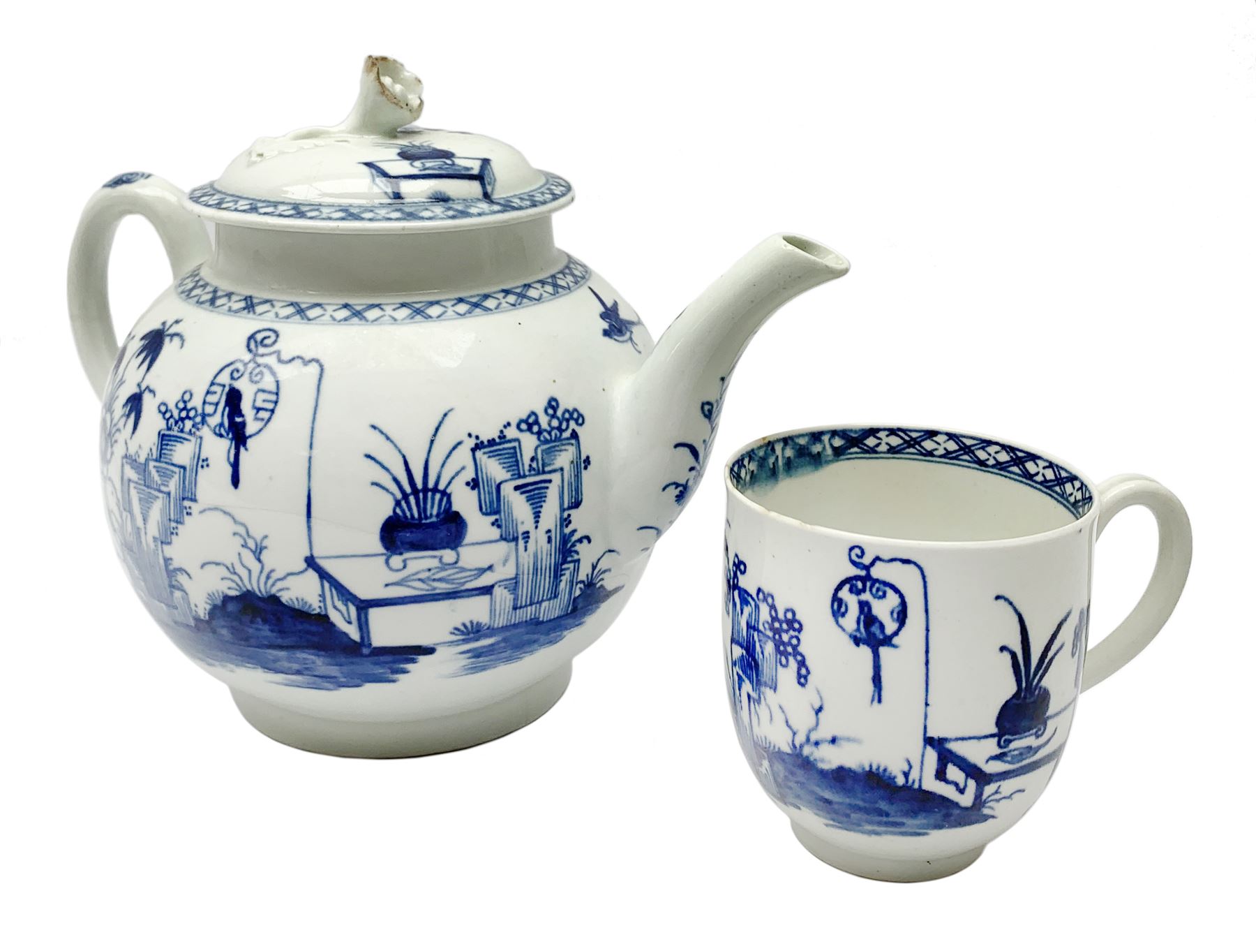 18th Century Worcester teapot, circa 1765-70, decorated in the Bird in the ring pattern, the cover with bud finial, with crescent mark beneath, H13cm, together with a Worcester coffee cup decorated in the same pattern, with crescent mark beneath, H6.5cm