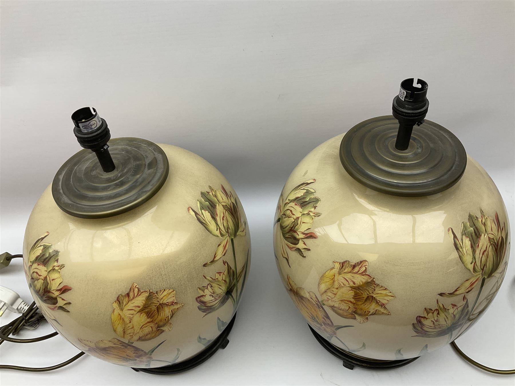 Pair of Potichomania tulip design glass table lamps, by Jenny Worrall, H40cm, with cream pleated lampshades. 