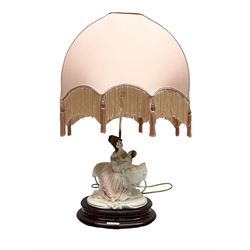 Capodimonte figural table lamp modeled as a woman and baby, signed B.Merli, with a tasseled shade, H59cm