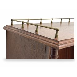 Mid-20th century mahogany open bookshelf, the rectangular top with a brass balustrade gallery, over three shelves each supported by turned column uprights, on shaped apron base