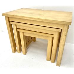 Light oak nest of three tables, square supports