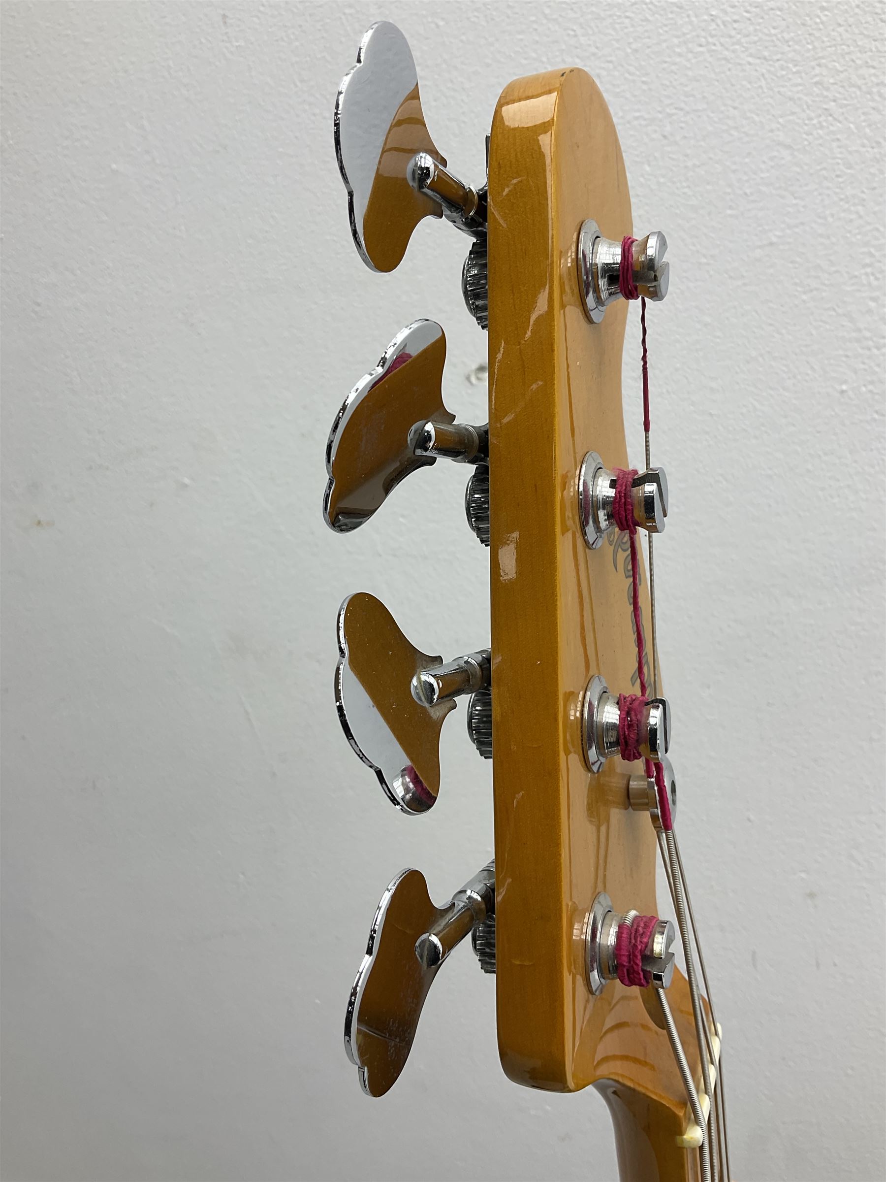 Richwood electric bass guitar in blue, cream and natural finish L117cm; in Fender soft carrying case; together with Behringer Thunderbird Bx108 amplifier date code 0 4 11.