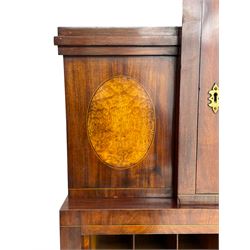 Early to mid-19th century figured mahogany Continental secrétaire à abattant, stepped top fitted with single cupboard, inlaid with oval figured amboyna panels, the fall front inlaid with shell motif enclosing a satinwood interior fitted with cupboard, drawers, and pigeon holes, three long drawers below, on square tapering feet