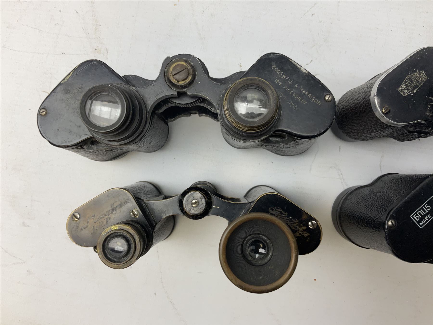 Quantity of binoculars for spares and repair, to include Cogswell & Harrison Primic 8x30, Prinz 8x30, Telstar 35x60, Zeiss Wetzland 8x40 etc