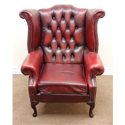  Georgian style wing back armchair, upholstered in deep buttoned Burgundy leather, cabriole legs (W90cm)  