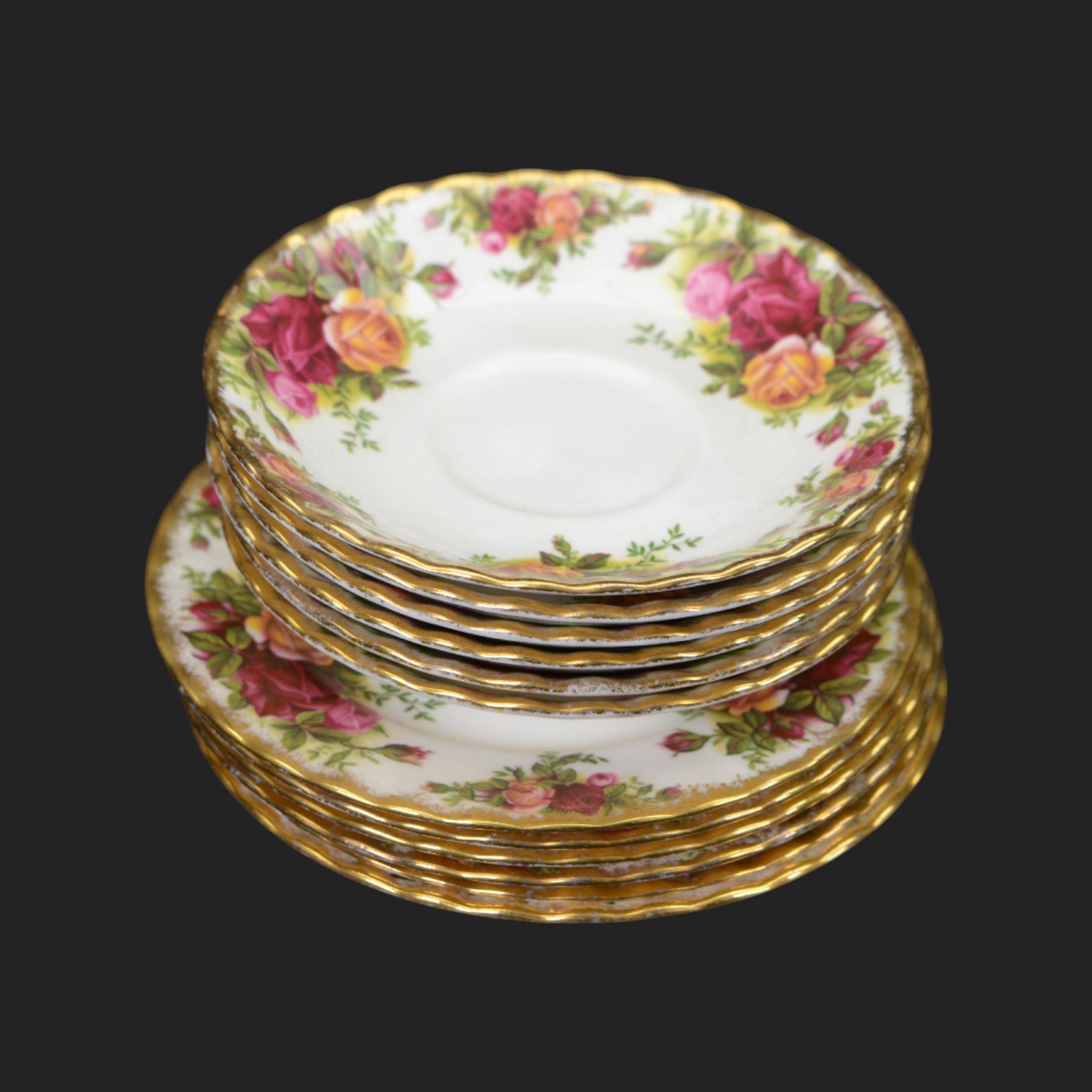 Royal Albert Country Roses tea and dinner service for six place settings, comprising teapot, milk jug, cups and saucers, dessert plates, side plates and dinner plates, all with printed mark beneath 
