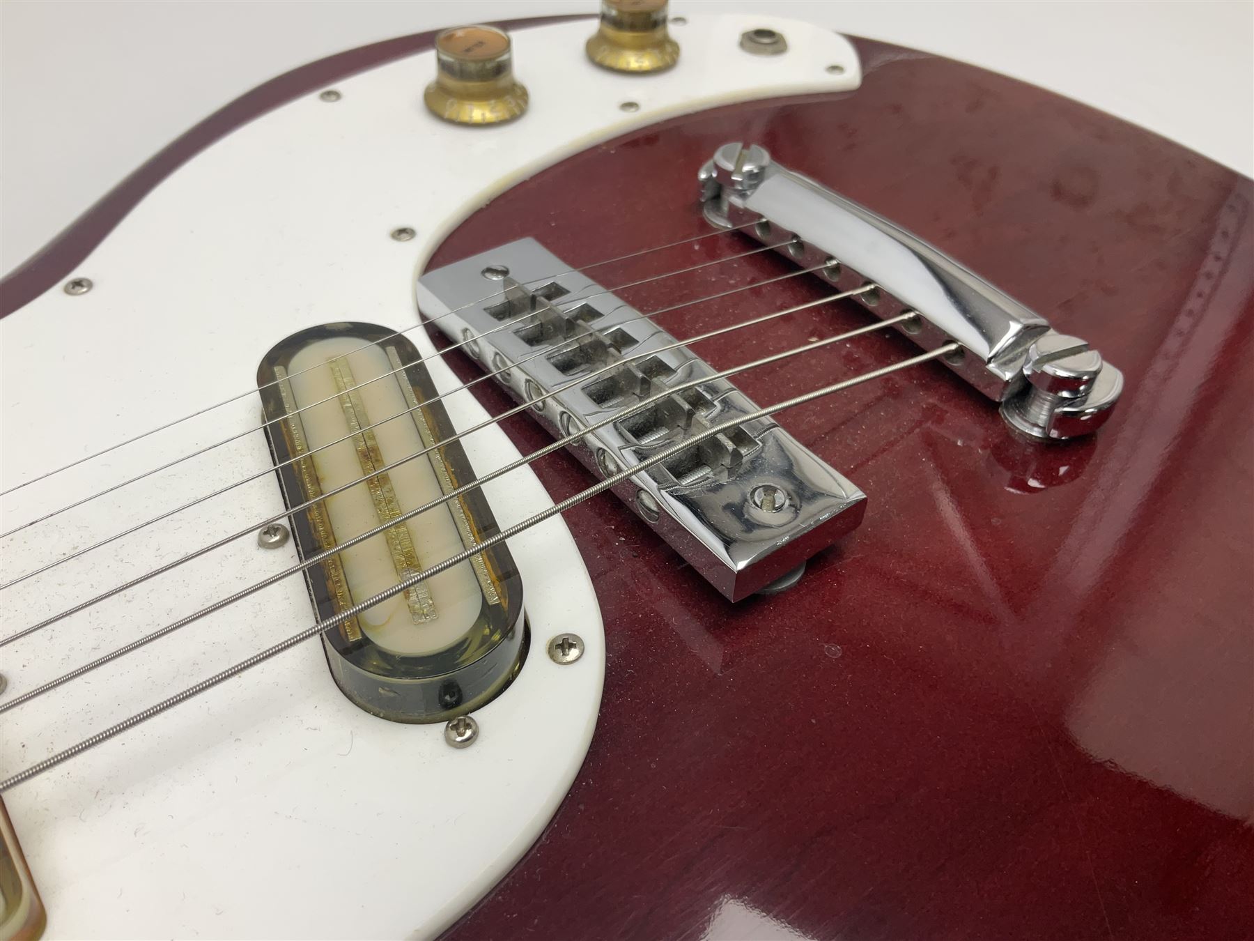 Gibson Marauder style six-string electric guitar with cherry coloured body, marked made in Japan L101cm; in locking hard carrying case