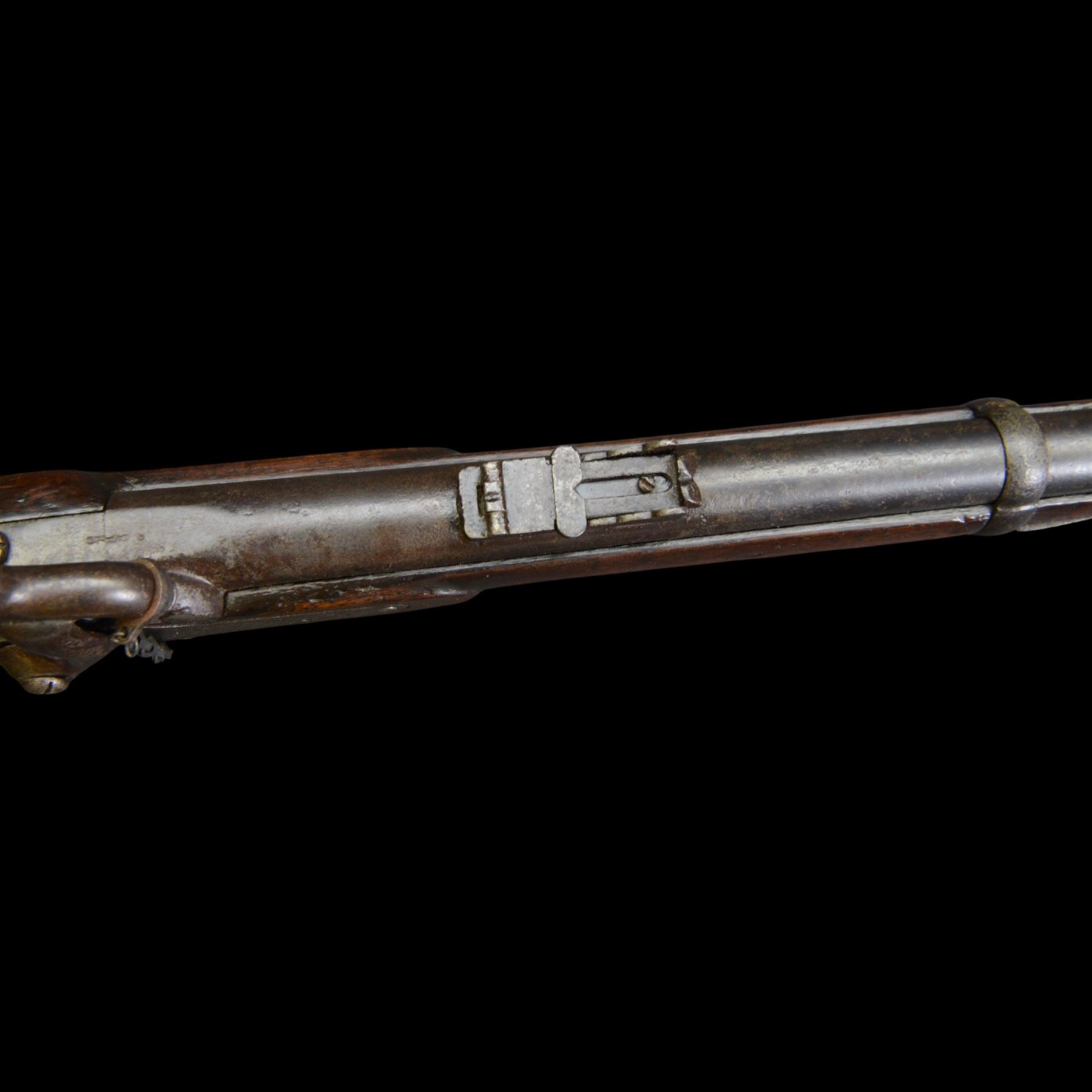 19th century Enfield percussion rifle, the 99cm barrel with three barrel bands, fore sight and rear sight, ramrod under, full walnut stock with brass butt, carrying sling brackets, action marked '1855 Tower' with Victoria cypher, overall L138cm