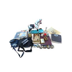 Dog cigarette box, glass decanter, two brass mantel clocks, snow globes, collection of Sma...