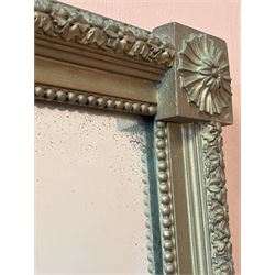 Edwardian giltwood and composition framed upright wall mirror, having a floral boss to each corner united by flowerhead decoration, enclosing an original distressed mirror plate. 193cm x 77cm.  - COLLECTION BY APPOINTMENT FROM: The White House, Thirsk Road, Easingwold, York, YO61 3NF - CALL 01723 507111 TO ARRANGE