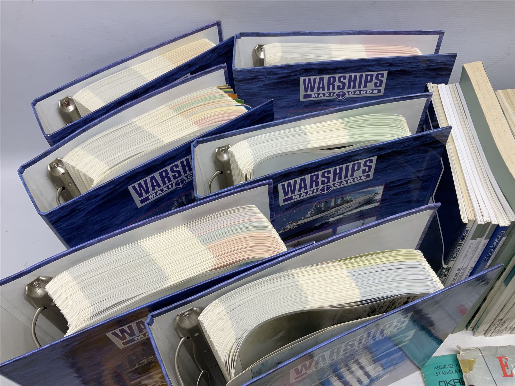 Six Atlas Editions ring binders of Warships Maxi Cards; and large quantity of booklets, cigarette cards etc of naval and shipping interest