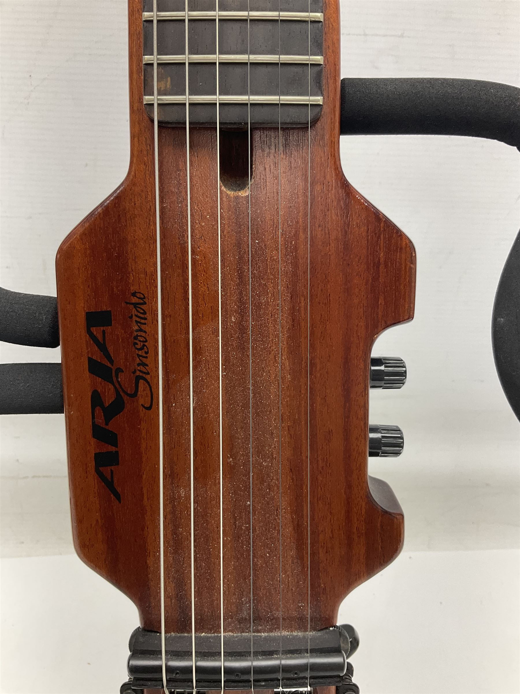 Aria Sinsonido mahogany electric travel guitar, serial no.0502385 L86cm; in original gig bag with earphones and GM11 Minituner; together with Fender Sidekick Reverb 25 amplifier and Marshall MG Series 15DFX amplifier (3)