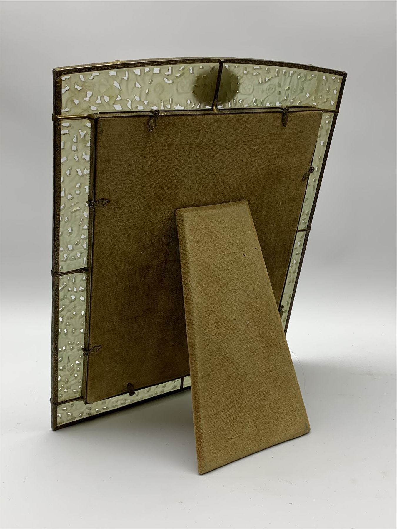 Early 20th century Chinese jade mounted photograph frame, of rectangular form the pierced jade frame carved with flowers and birds, the top panel carved with Foo dogs flaking an applied carved lavender coloured boss, with easel support verso, H33cm
