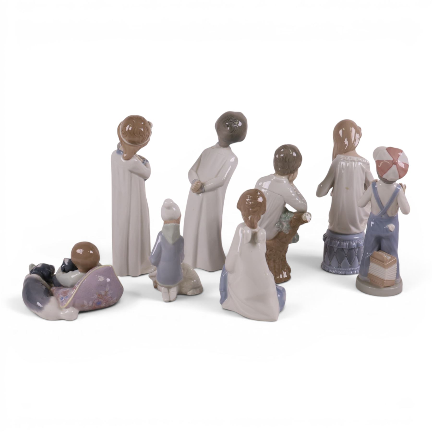 Five Lladro figures, Sweet Dreams 1535, Angel with Child 4635, Child with Lamb 4676 etc, together with two Nao figures 