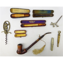  Early 20th century cheroot holders incl. a 9ct gold mounted ivory example, amber & meerschaum etc, cased folding corkscrew, Trench art corkscrew and miscellanea in one box  