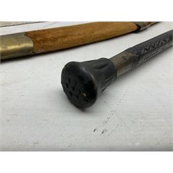 Early 20th century Indian ebonised sword stick, the 59.5cm blade with punched decoration and horn grip L94cm overall; and a reproduction Indian tulwar with scabbard (2)