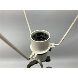 Composite table lamp modelled as a Roman Emperor donning blue robes, upon quatrefoil base modelled with rams heads and winged cherubs, H56cm excl fitting