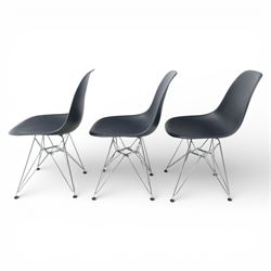 Vitra - set of six DSR side chairs designed by Charles and Ray Eames, moulded black plastic seats, raised on chromed wire Eiffel bases with plastic foot glides