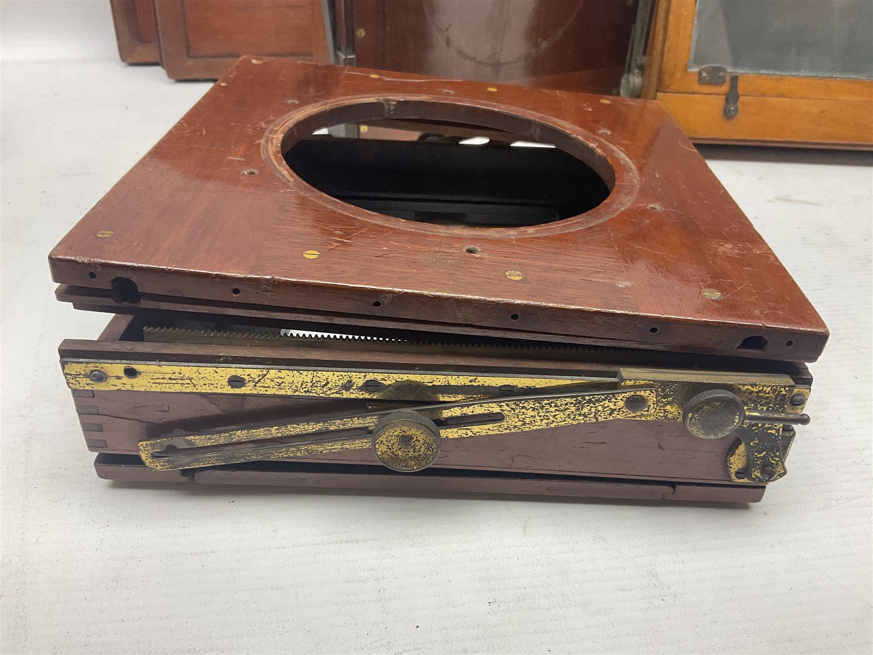Collation of folding plate cameras of various sizes folding plate in mahogany and lacquered brass, together with camera plates and slides
By vendors repute some slide are from the Gandolfi workshop