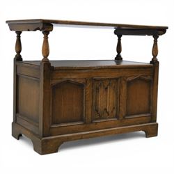 20th century oak monks bench with hinged box seat, with blind fretwork to the seat, panell...