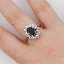 Gold oval cut sapphire and round brilliant cut diamond cluster ring, stamped 18ct, sapphire approx 1.50 carat, total diamond weight approx 0.60 carat