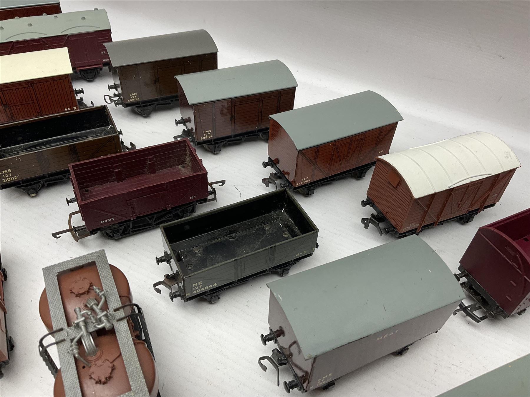 Hornby Dublo - forty-three goods wagons including nine tank wagons (Esso, Mobil, Vacuum, UD and Traffic Services), brake vans, meat and fish wagons, bogie well and bolsters, cable drums, open wagons, salt and grain wagons, etc; and six others by Tri-ang etc; all unboxed (49)