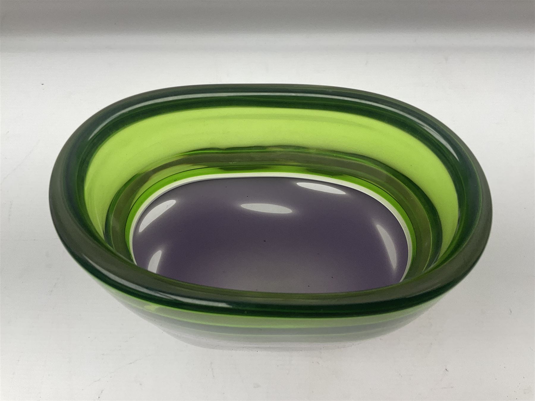 Stuart Akroyd glass vase, green banded top and opaque purple lower section with bubble inclusions, with sticker and engraved signature beneath, H25cm