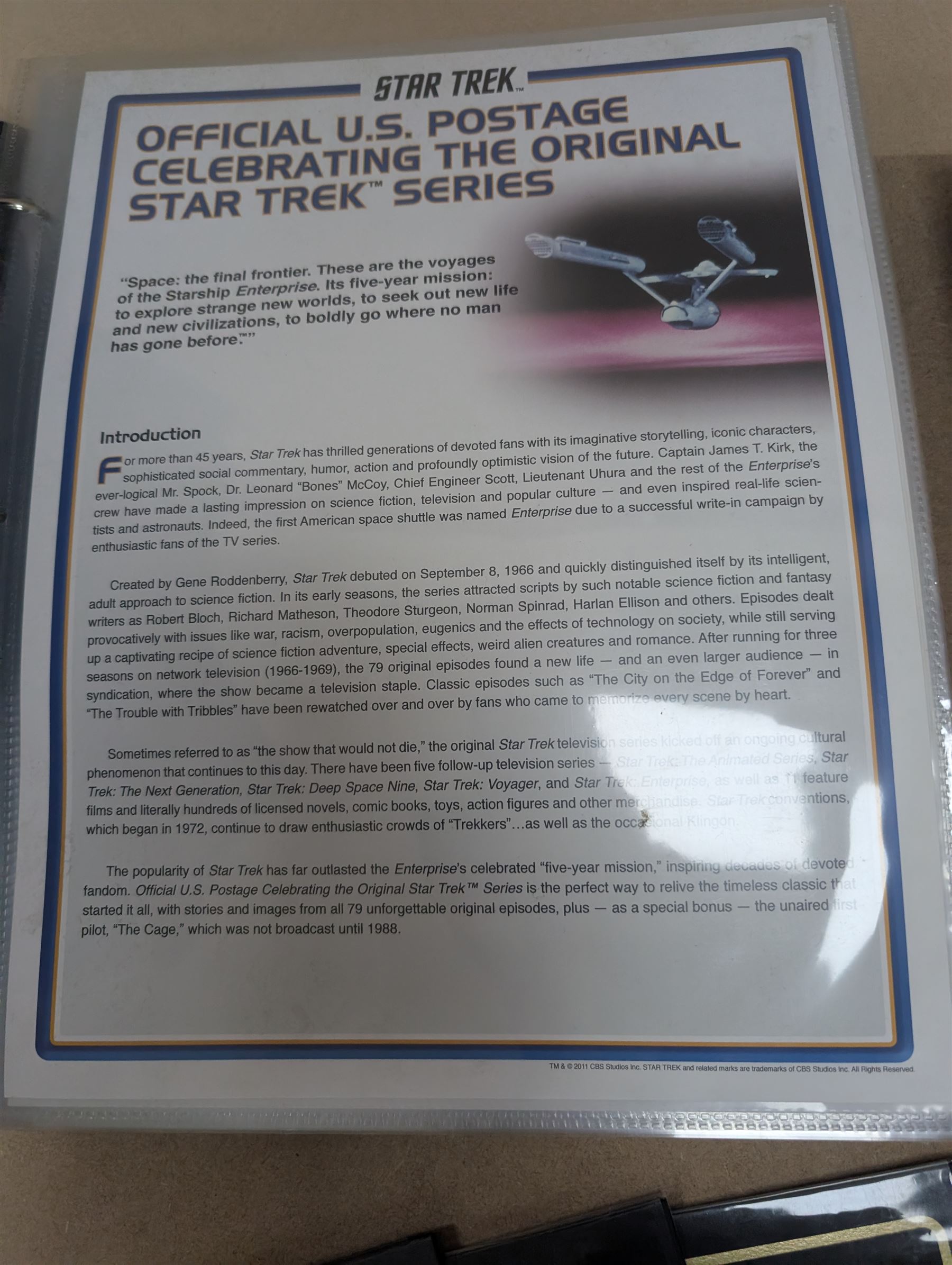 Star Trek collectables, including Danbury Mint '22ct Gold Card Collection', PCS Stamps and Coins Official US Postage Celebrating The Original Star Trek Series, Star Trek St Vincent and Grenadines first day cover collection, four stamp sets and a framed set of similar stamps, commemorative coins, Star Trek The Experience Las Vegas coin, three commemorative 'gold stamps' and three albums of collectors cards and telephone cards