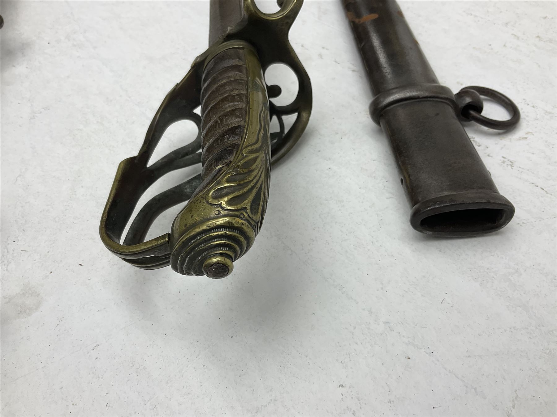 19th century Imperial German army heavy cavalry officers sword by Schnitzler and Kirschbaum, with 89cm single fullered steel blade and sheet steel basket hilt with teardrop cut-out and wire-bound leather grip L107.5cm overall; in steel scabbard with two suspension rings; and British Army 1822 Pattern Infantry Officer's sword in associated scabbard (2)