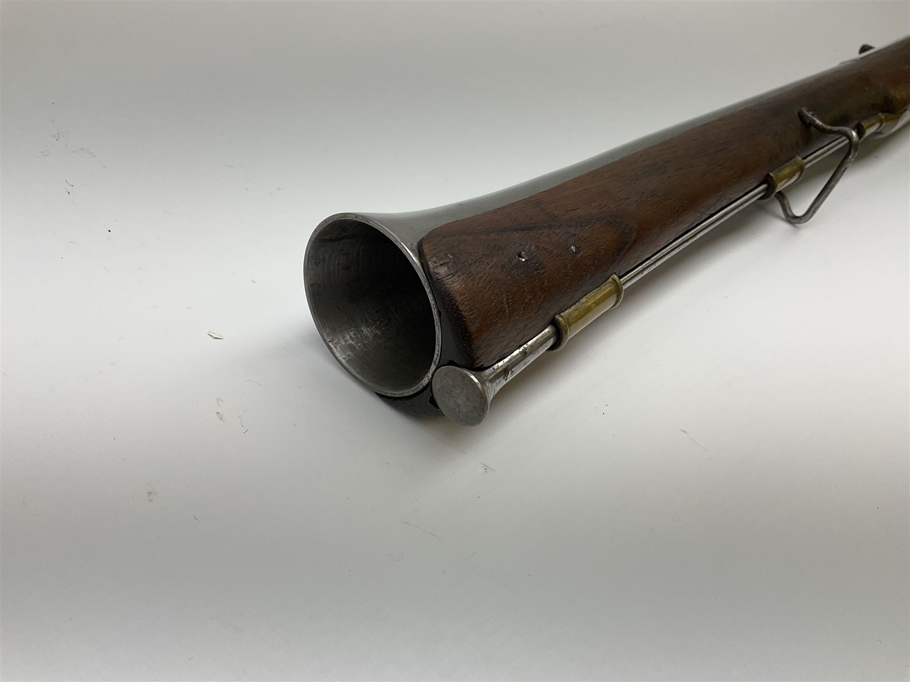 Reproduction 11-bore black-powder blunderbuss, the 61.5cm barrel with black-powder marks and ramrod under, walnut full stock with steel lock and brass fittings and two sling swivels, serial no.155, L101cm overall SHOTGUN CERTIFICATE REQUIRED