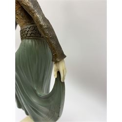 Joe Descomps (French 1869-1950): an Art Deco bronze and ivory figure, modelled as a Russian dancer with green enamelled skirt, circa 1925, upon stepped onyx base, signed to base, H28.5cm