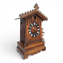 19th century Black Forest cuckoo mantel clock with carved architectural case, with eight day gong striking movement