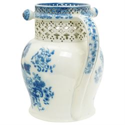 Swansea Cambrian pottery pearlware puzzle jug, c.1810, decorated in underglaze blue with peonies and sprigs of flowers, the straight-neck with three hollow spouts and openwork decoration, H18cm 