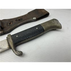 WWII German K98 (short) NCO dress bayonet, the 20cm fullered blade marked Anton Wingen Solingen to the ricasso, with chequered black grip plates; in steel scabbard with indistinctly stamped leather frog |L37cm overall