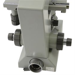 Three microscopes, including Griffin Student Vernier Microscope, Vickers Instruments binocular microscope with Leitz Wetzlar Periplan 10x lenses, and a Carl Zeiss Jena binocular microscope in a wooden Olympus Tokyo box