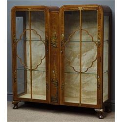  Early 20th century Chinoiserie decorated walnut display cabinet, double arched top, two glazed doors enclosing two glass shelves on cabriole feet, W107cm, H118cm, D32cm  