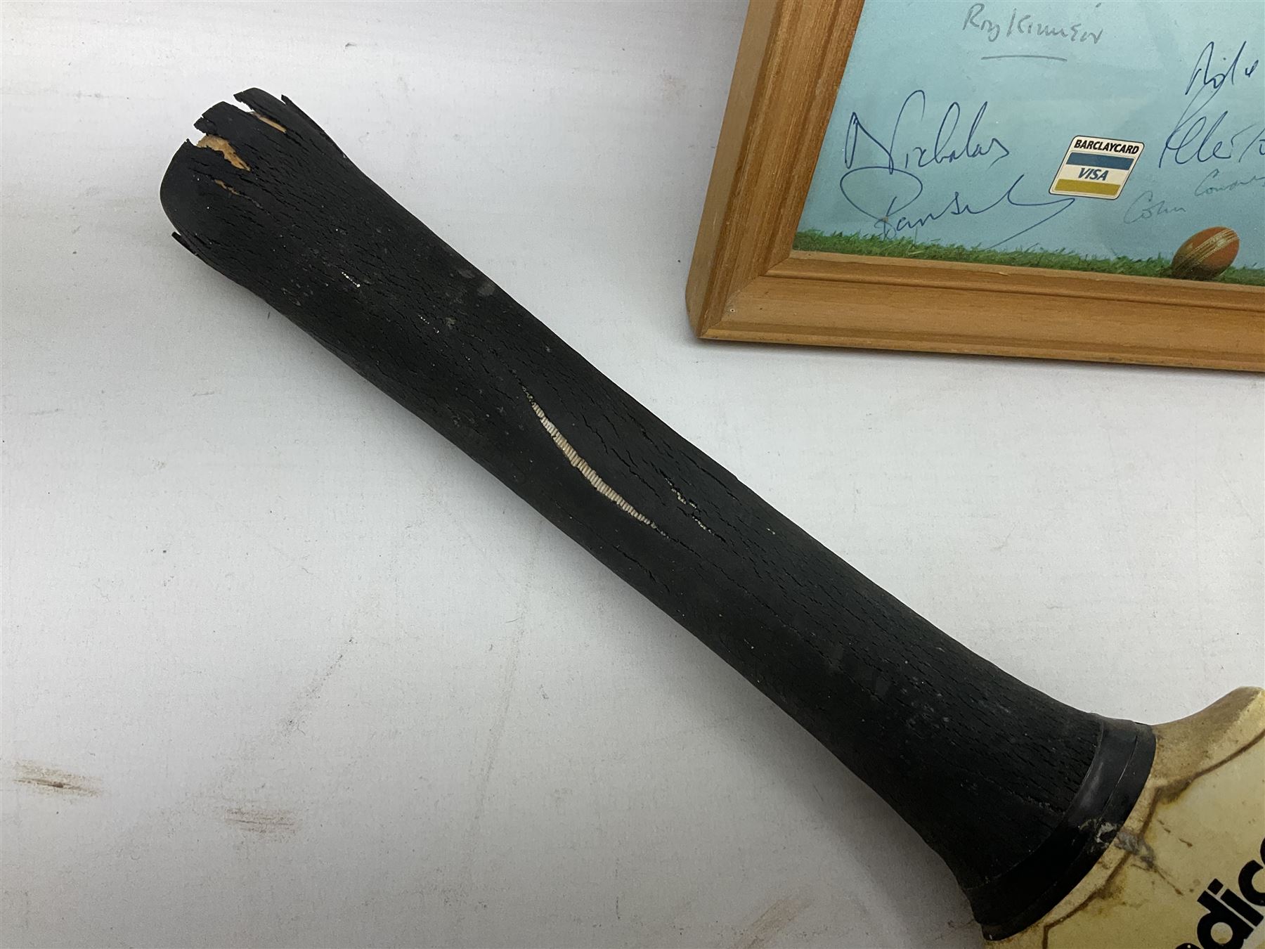 Sondico cricket bat with Yorkshire C.C.C. signatures; framed Lord Taverners v Barclaycard XI programme signed by Colin Milburn, Colin Cowdrey, Roy Kinnear, Nicholas Parsons etc; souvenir Ashes 1994/95 cricket ball; books of cricket interest; tie-pin etc