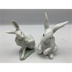 Six Lladro figures, comprising A Friend for Life no 7685, Rabbit Eating no 4773, Sitting Bunny no 5907, Washing up no 5887, Surprised cat no 5114 and Scar-dy Cat no 5092, all with original boxes, largest example H15cm 