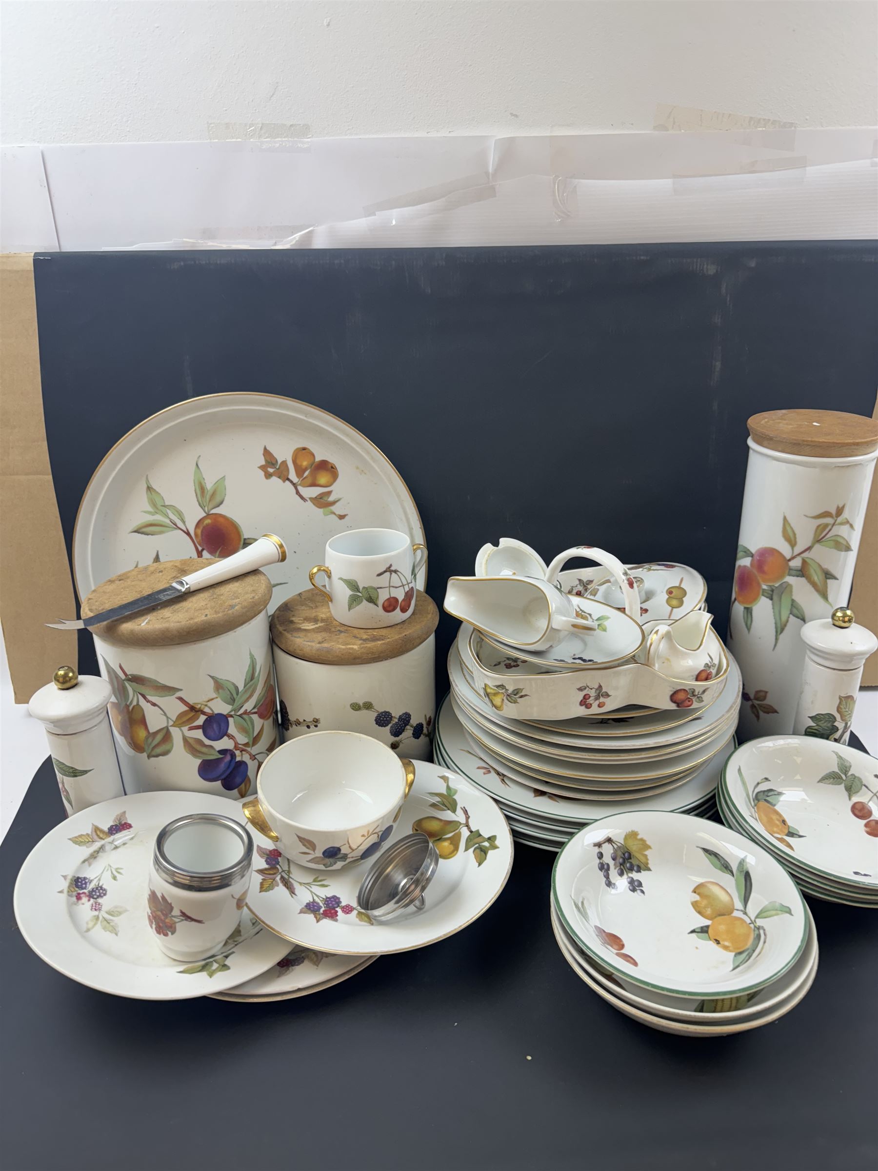 Royal Worcester Evesham pattern part dinner service, including covered jars, covered serving dishes, sauce jugs, dinner plates, side plates etc  
