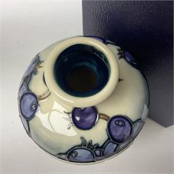 Moorcroft vase, of shouldered tapering form, decorated in the Juneberry pattern, circa 2000, H16cm with original box 