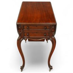 Victorian mahogany drop-leaf work table, the rectangular top with rounded hinged leaves above a bank of three drawers and opposing dummy drawers, fitted with a sliding work box, carved scroll and foliate knees, on cabriole supports with brass castors