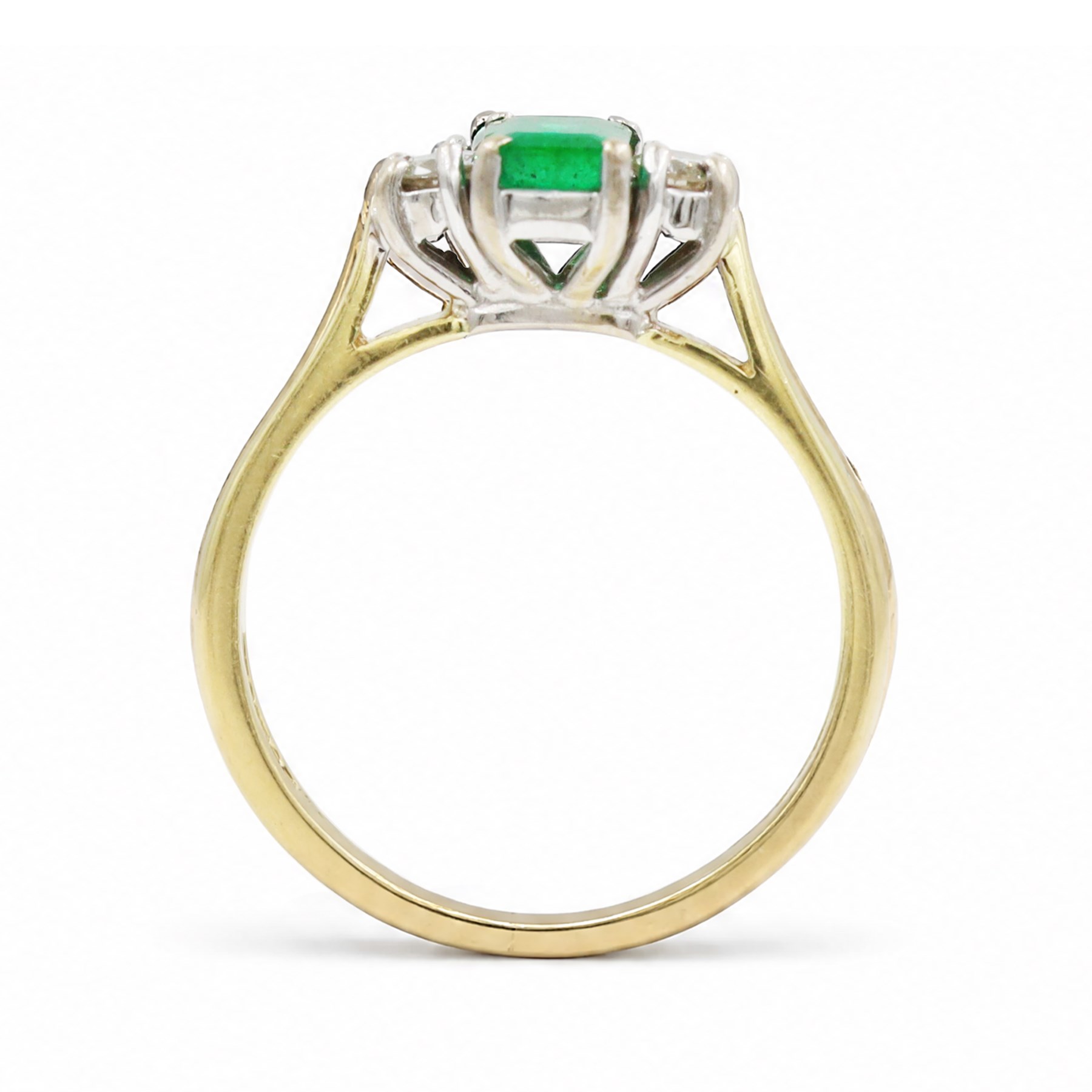 18ct gold emerald and diamond three stone ring, single octagonal cut emerald of approx 0.40 carat, with a round brilliant cut diamond set either side, Birmingham 1997, total diamond weight approx 0.15 carat