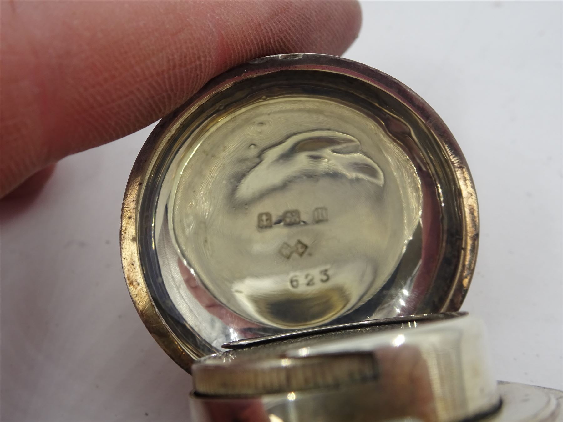 Early 20th century silver sovereign holder, of circular form, engraved with monogram, hallmarked William Luckett, Birmingham 1910, D3.5cm